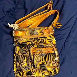 This is called the zebra print purse haven’t been used just got it